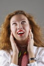 Excited woman looking up Royalty Free Stock Photo