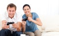 Excited woman playing video games Royalty Free Stock Photo