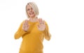 excited woman showing the sign of stop, neglect, negation and reluctance Royalty Free Stock Photo