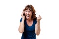 Excited woman yelling on her mobile phone Royalty Free Stock Photo