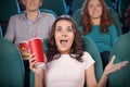 Excited women at the cinema.