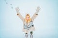 Excited young beautiful woman enjoy winter. Funny winter girl is going skate. Portrait of a happy amazed girl in the