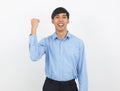 Excited young business Asian man raising his fists Royalty Free Stock Photo