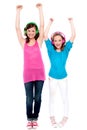 Excited young girls enjoying music together Royalty Free Stock Photo