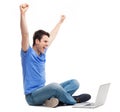 Excited young man using laptop Royalty Free Stock Photo