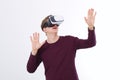 Excited young man in a VR headset, glasses. Virtual reality isolated on white background. Copy space and mock up Royalty Free Stock Photo