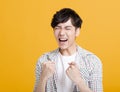 Excited young  man with yelling face Royalty Free Stock Photo