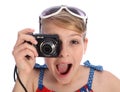 Excited young photographer girl taking pictures Royalty Free Stock Photo