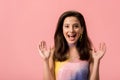 Young stylish disco girl with open mouth isolated on pink