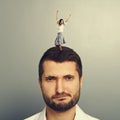 Excited young woman dancing on the head Royalty Free Stock Photo