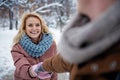 Excited young woman having fun with man in park Royalty Free Stock Photo