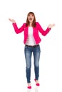 Excited Young Woman Is Holding Arms Outstretched And Shouting Royalty Free Stock Photo