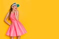 Excited Young Woman In Pink Mini Dress Is Looking Away And Laughing Royalty Free Stock Photo