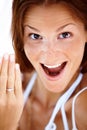 Excited young woman showing her engagement ring. Closeup portrait of excited young woman showing her engagement ring. Royalty Free Stock Photo