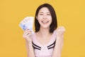 Excited young woman showing the  money Royalty Free Stock Photo