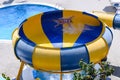 Excitement in descent: person on water slide at pool Royalty Free Stock Photo