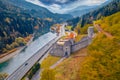 Exciting autumn view from flying drone of Muhlbacher Klause castel. Royalty Free Stock Photo