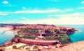 Exciting charming look at the bird`s eye view of the the old fortress, city and harbor Kerkira, Corfu, Greece. popular tourist Royalty Free Stock Photo