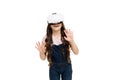 Exciting interaction. Future of VR is here. Little girl wearing virtual reality headset. Future of entertainment and