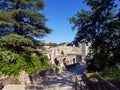 Exciting panoramic landscape of medieval town Besalu with majestic stone arched bridge with towers across the Fluvia river. Besal