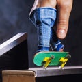 An exciting ride on a mini skateboard or fingerboard on a specially equipped track