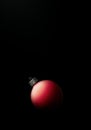 Exciting Studio shot of a modern matte red Christmas ball Royalty Free Stock Photo