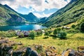 Exciting summer scene of Geiranger port, western Norway. Sunny view of Sunnylvsfjorden fjord. Traveling concept background.