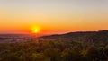 Exciting sunrise over fogged city and park, aerial view, Lviv