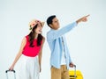 Exciting travel, happy holiday. Summer vacation. Asian couple travelers looking out gestures with exciting. Royalty Free Stock Photo