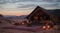 Exclusive desert camping setup with lanterns at sunset Royalty Free Stock Photo