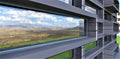 Exclusive exterior of an apartment building built in a mountainous region. The aluminum finish goes well with the reflective glass Royalty Free Stock Photo