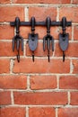 Exclusive hooks in the form of a cast-iron trident Royalty Free Stock Photo