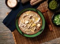 Exclusive sauerkraut and white meat pot with chopsticks served in pot isolated on table top view of taiwan food Royalty Free Stock Photo