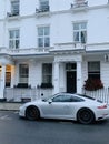 Chelsea district in London with luxury houses and cars and famous residents living here