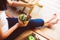 Excretory good system concept,Woman hands holding and eating healthy salad for breakfast in the morning Royalty Free Stock Photo