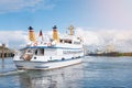 Excursion boat leaving harbor on the island of Sylt, Germany Royalty Free Stock Photo