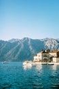 Excursion boat is moored off the coast of Perast near the fishing boats. Montenegro Royalty Free Stock Photo