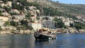 Excursion replica of the old-time fishing boat underway off the Dalmatian Coast at Dubrovnik, Croatia Royalty Free Stock Photo