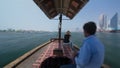 Trip on traditional Abra boat at the creek in Dubai, UAE timelapse