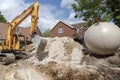 Excuvating chalk to form a trench for a plastic tank Royalty Free Stock Photo