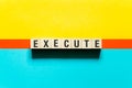 Execute word concept on cubes Royalty Free Stock Photo