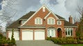 Red Brick Large Home Dwelling Residence House Triple Garage Roof Front View Exterior Royalty Free Stock Photo