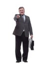Executive business man with a leather briefcase . Royalty Free Stock Photo
