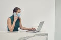 Executive girl making call wearing face mask Royalty Free Stock Photo