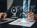 Executive monitoring global market performance with interactive dashboard and world map graphics Royalty Free Stock Photo