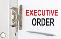 EXECUTIVE ORDER text on the paper folder with pen. Business concept