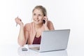 Executive woman working on computer sitting at sparse desk to freelance Royalty Free Stock Photo