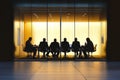 Executives engaged in confidential negotiations in a corporate boardroom setting Royalty Free Stock Photo
