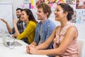 Executives listening presentation in conference room at office Royalty Free Stock Photo