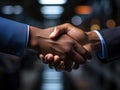 Executives seal deal with handshake